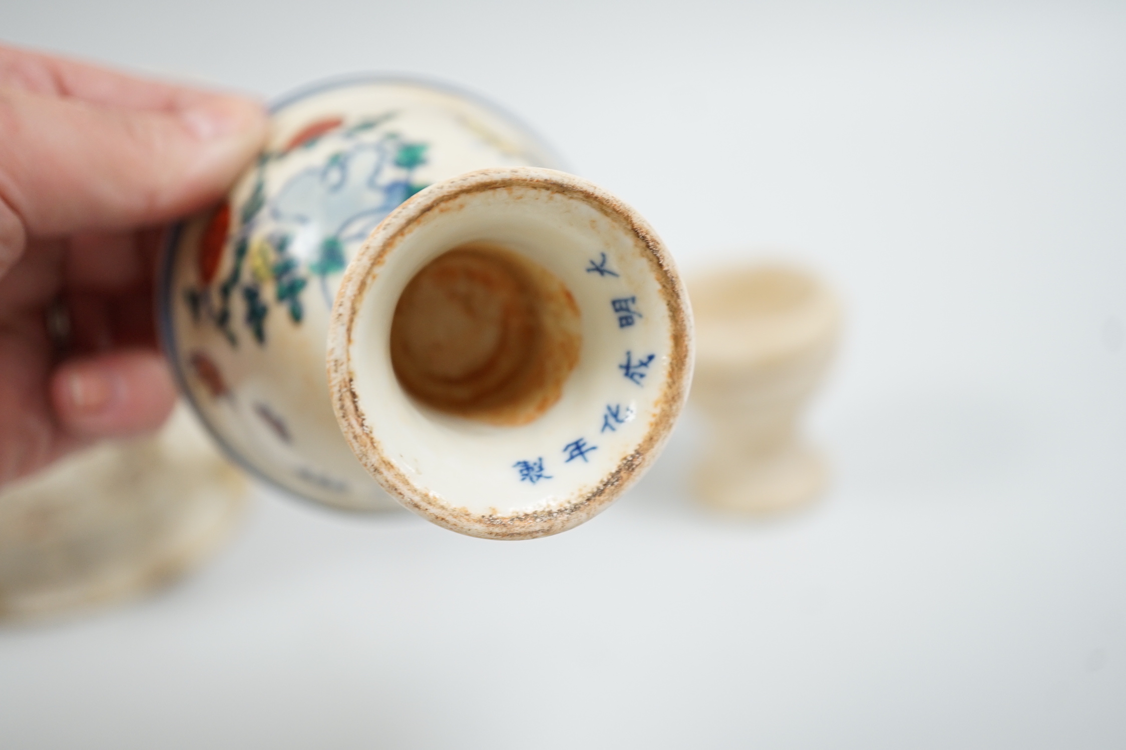 A Chinese burnt jade or hardstone censer, a stone cup and a doucai stem cup, censor 12cm high